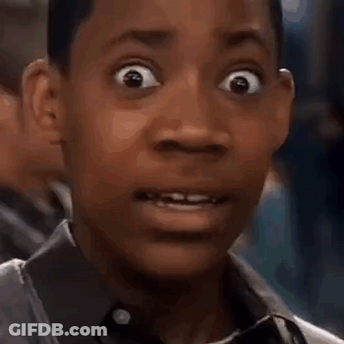 Man With Backpack In Hallway GIF
