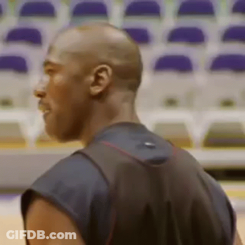 Man With Backpack Standing In Front Of Empty Seats GIF