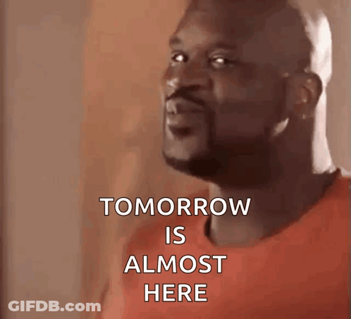 Man With Backpack Standing In Front Of Sawmill Sign GIF