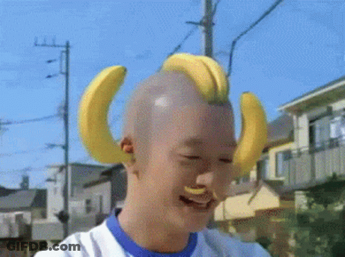 Man With Bananas On Head Smiling Laughing GIF