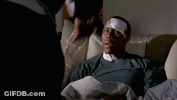 Man With Bandage On Eye Laying In Chair GIF