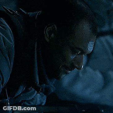 Man With Bandage On Forehead Looking Down GIF