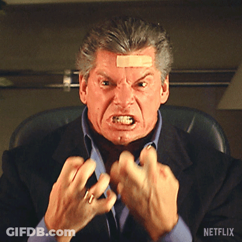 Man With Bandage On Forehead Sitting In Chair With Netflix Logo GIF