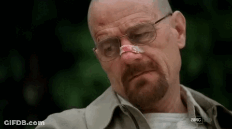 Man With Bandage On Nose And Glasses Looking Down GIF
