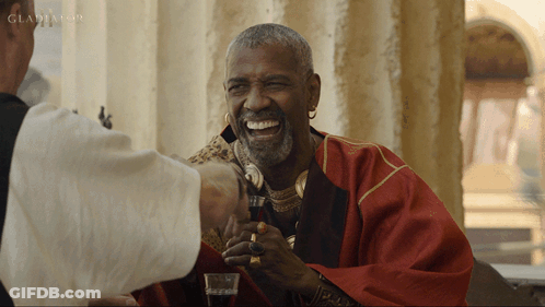 Man With Bandage Sitting At Microphone GIF