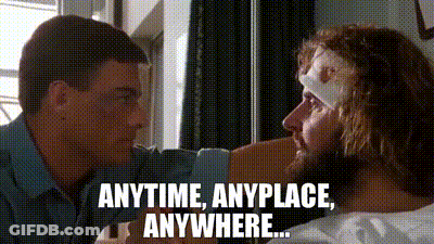 Man With Bandaged Head Talking To Another Man GIF