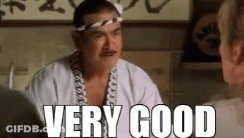 Man With Bandana And Headband Talking To Woman GIF
