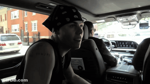 Man With Bandana And I Love You Tattoo In Roman Numerals GIF