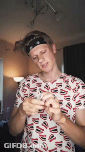 Man With Bandana And Teeth Pattern T-Shirt GIF