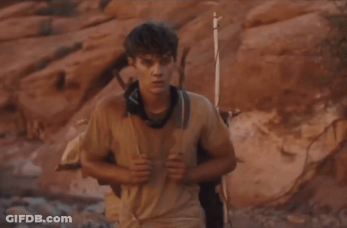 Man With Bandana Carrying Backpack GIF