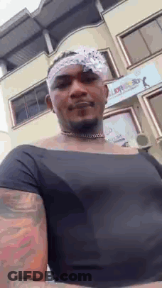 Man With Bandana In Black Shirt And Choker GIF