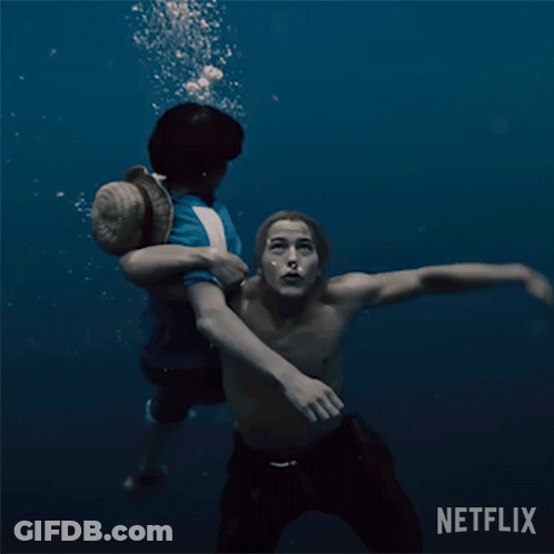 Man With Bandana Next To Woman GIF