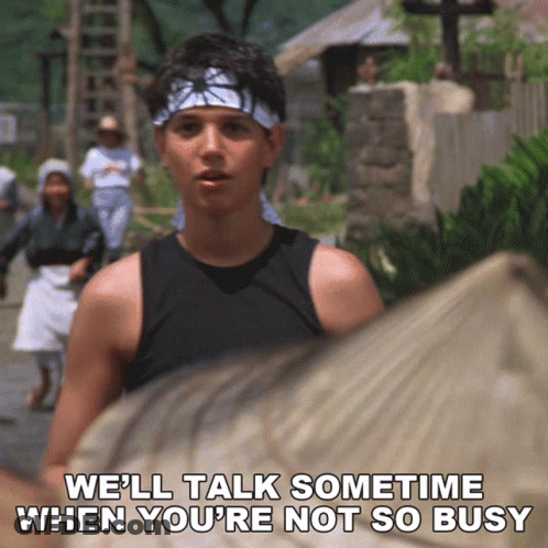 Man With Bandana Says We'll Talk Sometimes When You're Not So Busy GIF