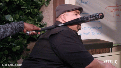 Man With Bat In Mouth Netflix Logo GIF