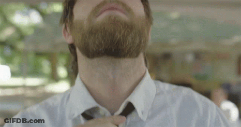 Man With Beard Adjusting Tie GIF