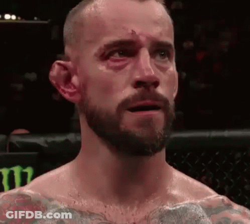 Man With Beard And Black Eye In Boxing Ring Eyes Closed GIF
