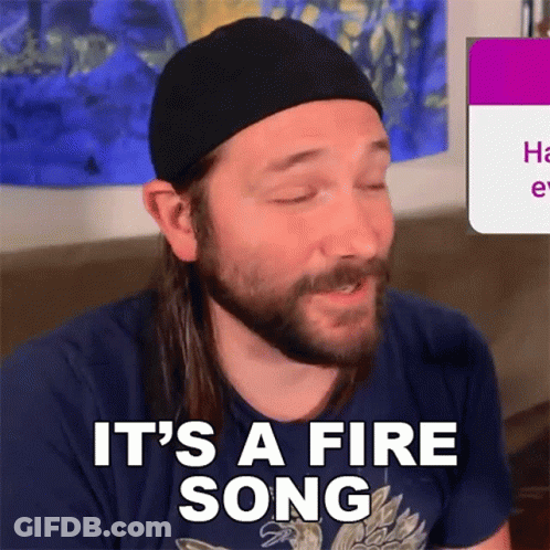 Man With Beard And Black Hat Says Fire Song GIF