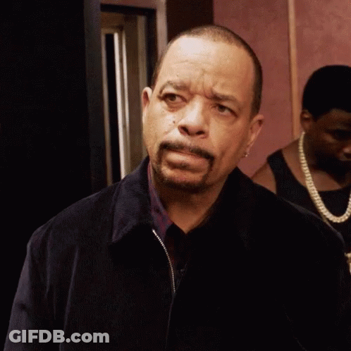 Man With Beard And Black Jacket Looking At Camera GIF