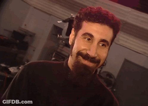 Man With Beard And Black Shirt Smiling GIF