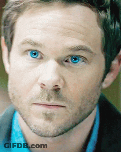Man With Beard And Blue Eyes Looking At Camera GIF