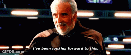 Man With Beard And Cape Saying Looking Forward GIF