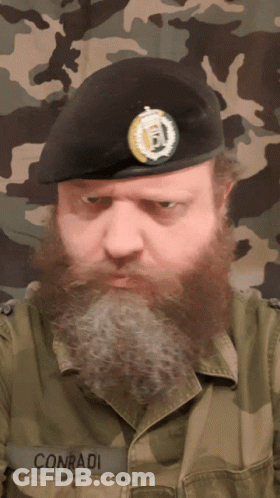 Man With Beard And Conradi On Jacket GIF