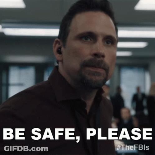 Man With Beard And Ear Buds Says Be Safe Please GIF