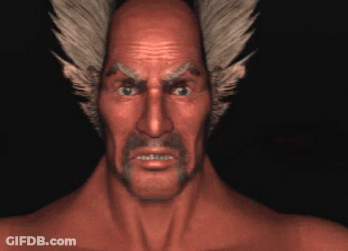 Man With Beard And Feathered Hair Close Up GIF