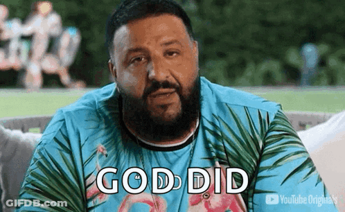 Man With Beard And Flamingo Shirt Sitting On Couch GIF