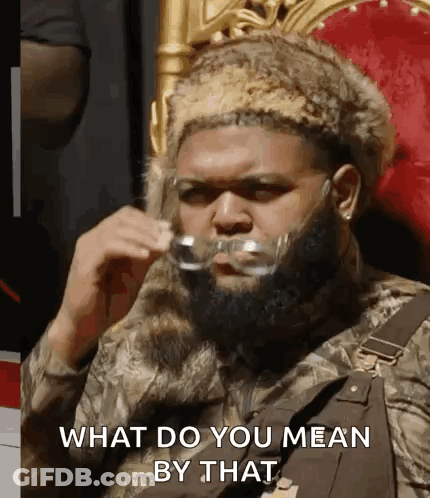 Man With Beard And Fur Hat Saying What GIF
