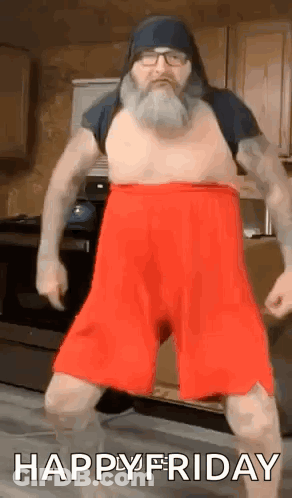 Man With Beard And Glasses Dancing In Kitchen GIF