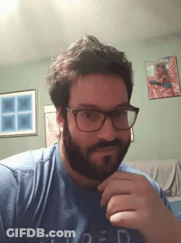 Man With Beard And Glasses In Blue Loaded Shirt GIF