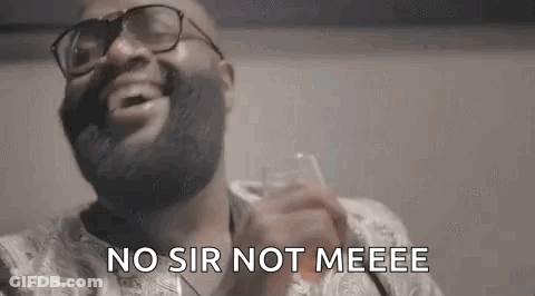 Man With Beard And Glasses Laughing Holding Water GIF