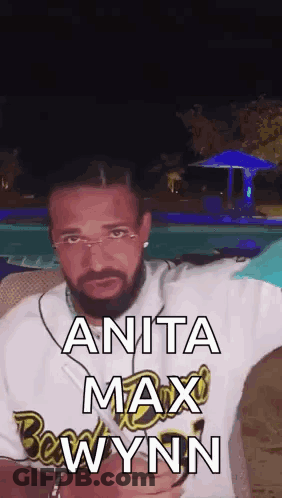 Man With Beard And Glasses Next To Pool GIF