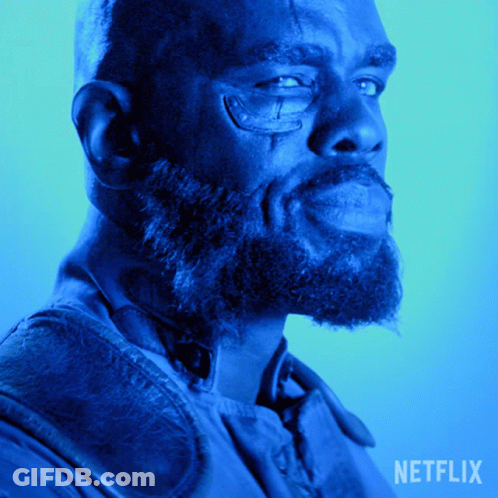 Man With Beard And Glasses On Netflix Background GIF