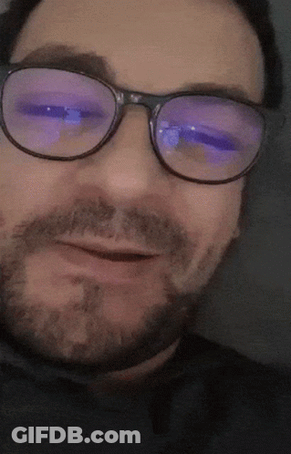 Man With Beard And Glasses Smiling GIF