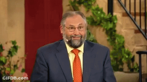 Man With Beard And Glasses Talking Into Microphone GIF