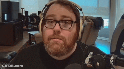Man With Beard And Glasses Wearing Headphones GIF