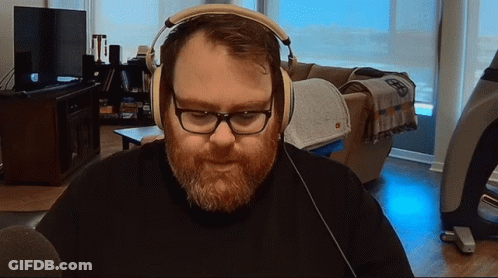 Man With Beard And Glasses Wearing Headphones GIF