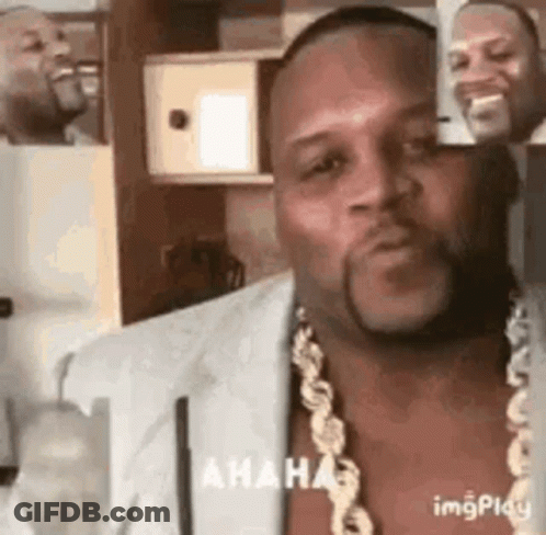 Man With Beard And Gold Chain Making Funny Face GIF