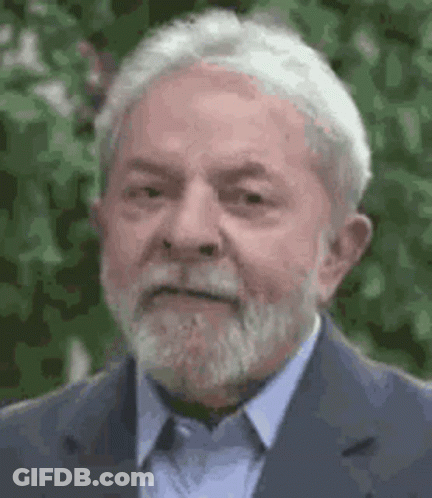 Man With Beard And Gray Hair In Blue Suit GIF