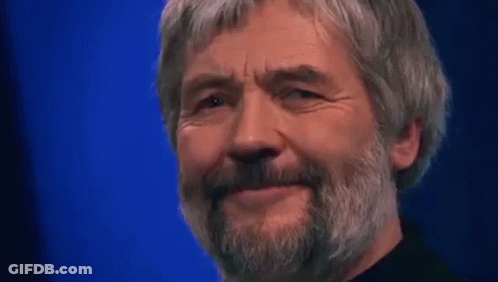 Man With Beard And Gray Hair Smiling GIF