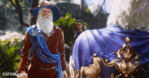 Man With Beard And Hat Standing Next To Woman GIF