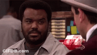 Man With Beard And Hat Talking To Another Man In Restaurant GIF