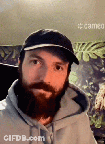 Man With Beard And Hat With Cameo Logo GIF