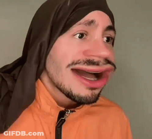 Man With Beard And Head Scarf Making Funny Face GIF