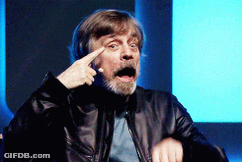 Man With Beard And Leather Jacket Pointing At Forehead GIF