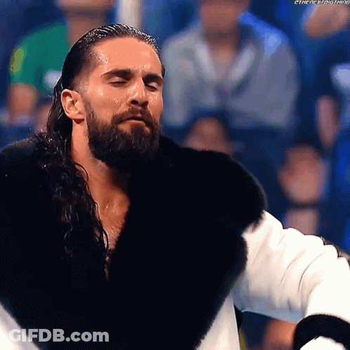 Man With Beard And Long Hair In Fur Coat GIF