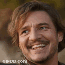 Man With Beard And Long Hair Smiling GIF