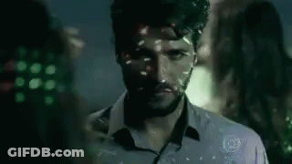 Man With Beard And Mask Looking At Camera GIF